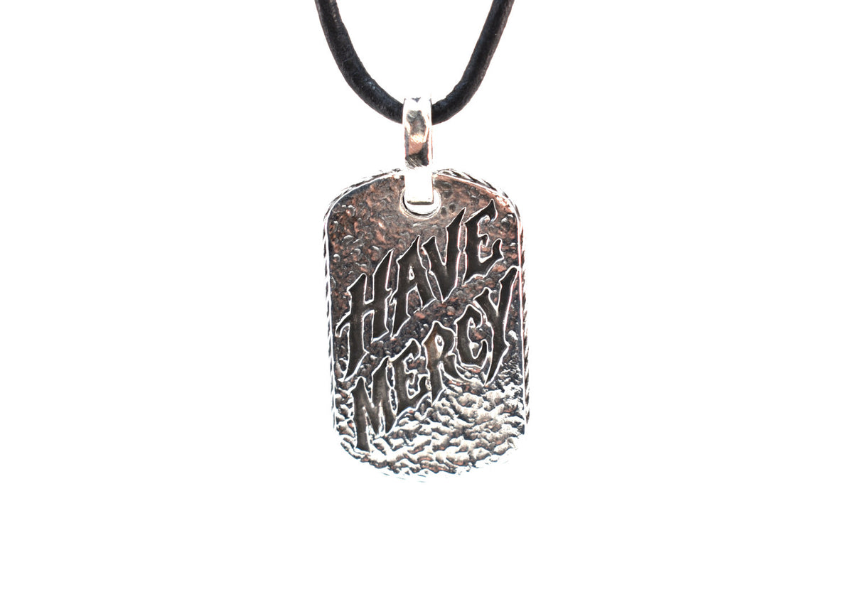 Have Mercy .925 sterling silver dog tag pendant by Billy F Gibbons on black leather cord, front view